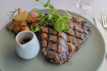 T Bone steak with potatoes