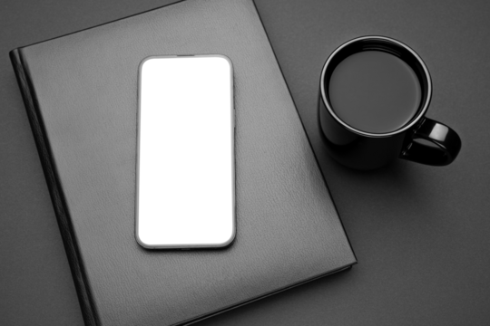 Mockup display. Mobile cell phone blank screen. Smartphone technology. Office equipment. Office workplace, black notebook, cup of tea or coffee. Mock up device for application, website design project.