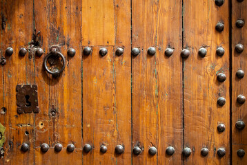 An old wooden door in Morocco Marrakesh medina.