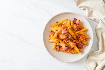 stir-fried penne pasta with kimchi and bacon