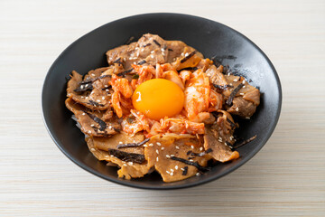 pork bulgogi rice bowl with kimchi and Korean pickled egg