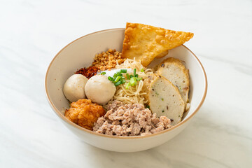 spicy egg noodles with fish balls and shrimp balls without soup