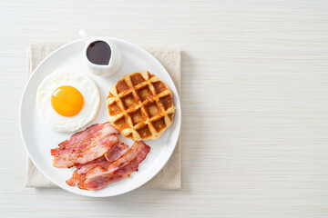 fried egg with bacon and waffle