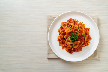farfalle pasta in tomato sauce with parsley