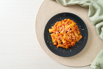 Rigatoni pasta bolognese with cheese