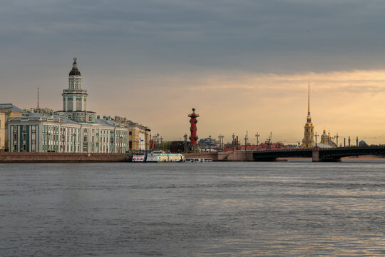 View of the Neva River, University Embankment, the Kunstkamera building, Peter and Paul Fortress and the Palace Bridge on a spring morning, St. Petersburg, Russia