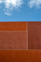 Orange and Brown Wall with White Mortar Under Blue Sky in Hawaii.