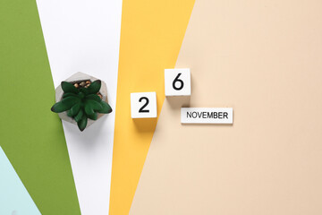 Block Calendar with the date november 26 on colored background