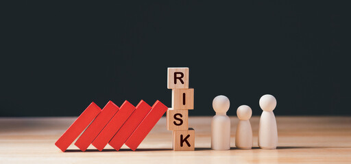 Business Risk, Crisis Management Concept. Hand stopping wooden domino protect business crisis...