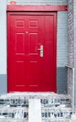 Red doorway in street in Beijing, China