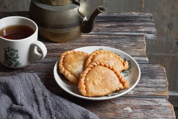 Delicious Curry Puff or Malaysian people called Karipap filled with potato filling
