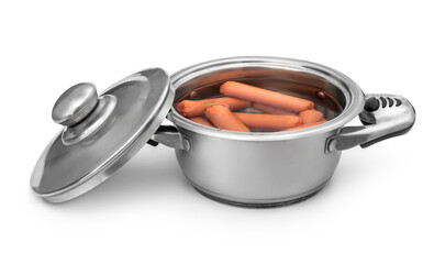 Sausages boiling in enamel steel cooking pan. Isolated on white.
