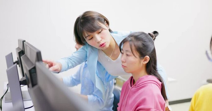 teacher in adult education class