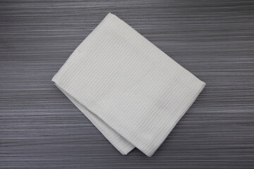 Grey tea towel on anthracite board