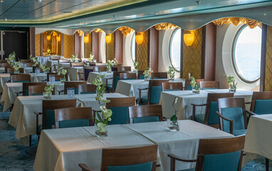 Sea cruises. interior of restaurant on sea liner. meals on cruises. internal public areas on board cruise ship