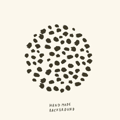 Abstract round shape with black paint strokes