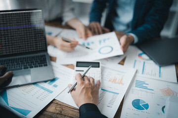 Asian business advisor meeting to analyze and discuss the situation on the financial report in the meeting room.Investment Consultant, Financial , teamwork ,brainstorming ,startup and accounting