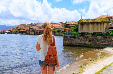 Traveler Woman tourist in Galicia,  Combarro, Pontevedra in Spain
