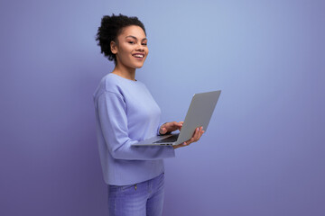 successful young afro hair brunette business woman working using laptop