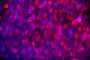 Abstract glitter sparkle explosion background for celebrations. Light fireworks. Abstract bokeh background. Christmas, birthday holiday blurred abstract design. Glitter texture, abstract background.