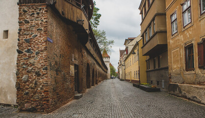 Medieval street with historical buildings in the heart of Romania. Sibiu the eastern European citadel city. Travel in Europe