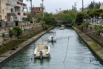 Boats staying on the river by the sea