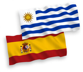 Fototapeta premium Flags of Oriental Republic of Uruguay and Spain on a white background