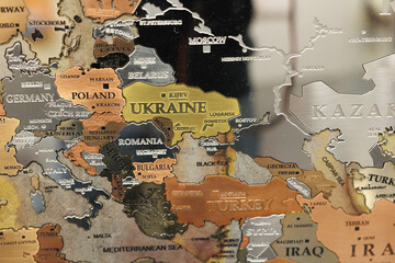 Geographic Map Made of Metallic Material with the Ukrainian territories in the Foreground
