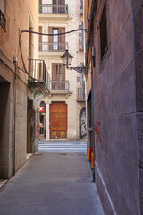 Typical Narrow Barcelona Street with Antique Lamppost, Spain