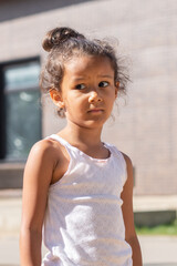 surprised child, a portrait of an African girl with big eyes and a judgmental look, Facepalm