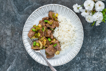 Steak and celery stir fry with rice