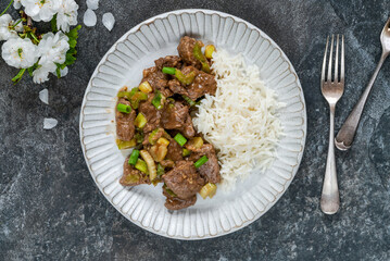 Steak and celery stir fry with rice