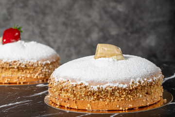 Strawberry and Banana Pie. German pie. Assortment of strawberry and banana cakes on a dark background. Close up