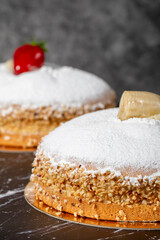 Strawberry and Banana Pie. German pie. Assortment of strawberry and banana cakes on a dark background. Close up