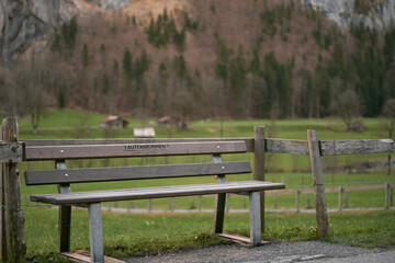 empty bench in the Swiss Alps mountains.