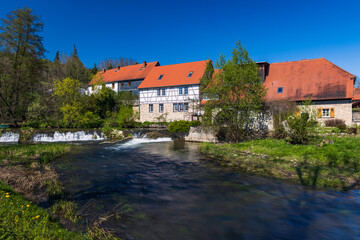 Fototapeta na wymiar Wassermühle in Buchfart am Fluss Ilm in der Nähe von Weimar