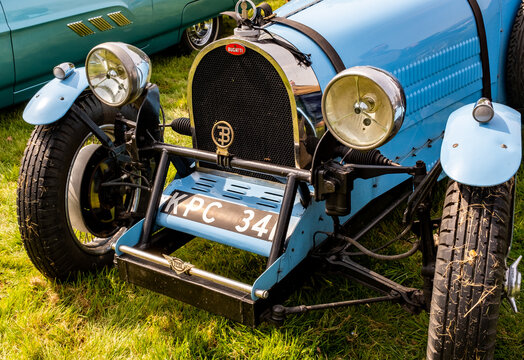 Earsham, Norfolk, UK &ndash; April 30 2023. Close up of the front end of a fully restored classic Bugatti sports car on display at a small and local outdoor car show