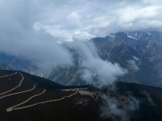 Driving car on high altitude mountains in Tibet,  China