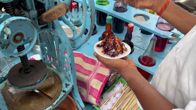 footage of making Indian Ice Gola Dish, Ice Popsicle 4K, Street Food. Summer special.