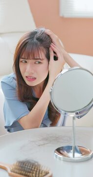 asian girl worry hair loss