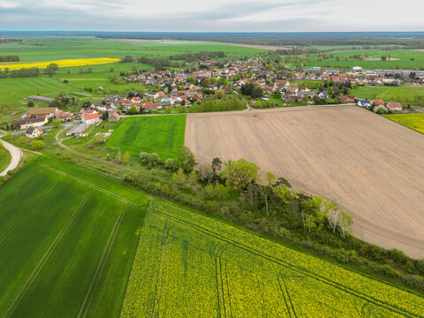 Aerial view of a small village with fields around in Saxony Anhalt, Germany