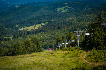 Fototapeta na wymiar Ski lift on a sunny summer day.