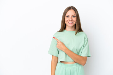Young Lithuanian woman isolated on white background pointing to the side to present a product