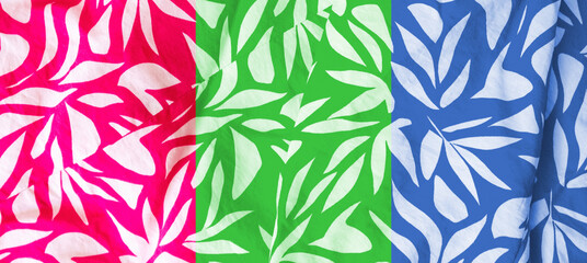 Banner of floral cloth pattern in pink, green and blue colors. Beautiful floral design with blouse texture for text and advertising. Vintage design. Close up photo. Summer vibes.