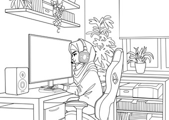 Girl gamer or streamer with a headset sits in front of a computer in a cozy room