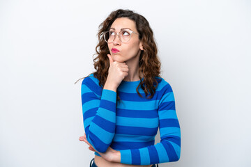 Young caucasian woman isolated on white background having doubts