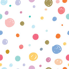 Abstract seamless pattern with colorful hand drawn polka dots on a white background. Lovely childish backdrop for wrapping, packaging, textile and interior decoration