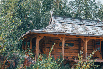 Fototapeta premium Wooden cabin in the woods.
