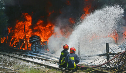 Firefighters are extinguishing the fire