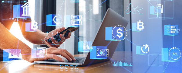 Man with laptop and phone, decentralized hologram with cryptocurrency and data